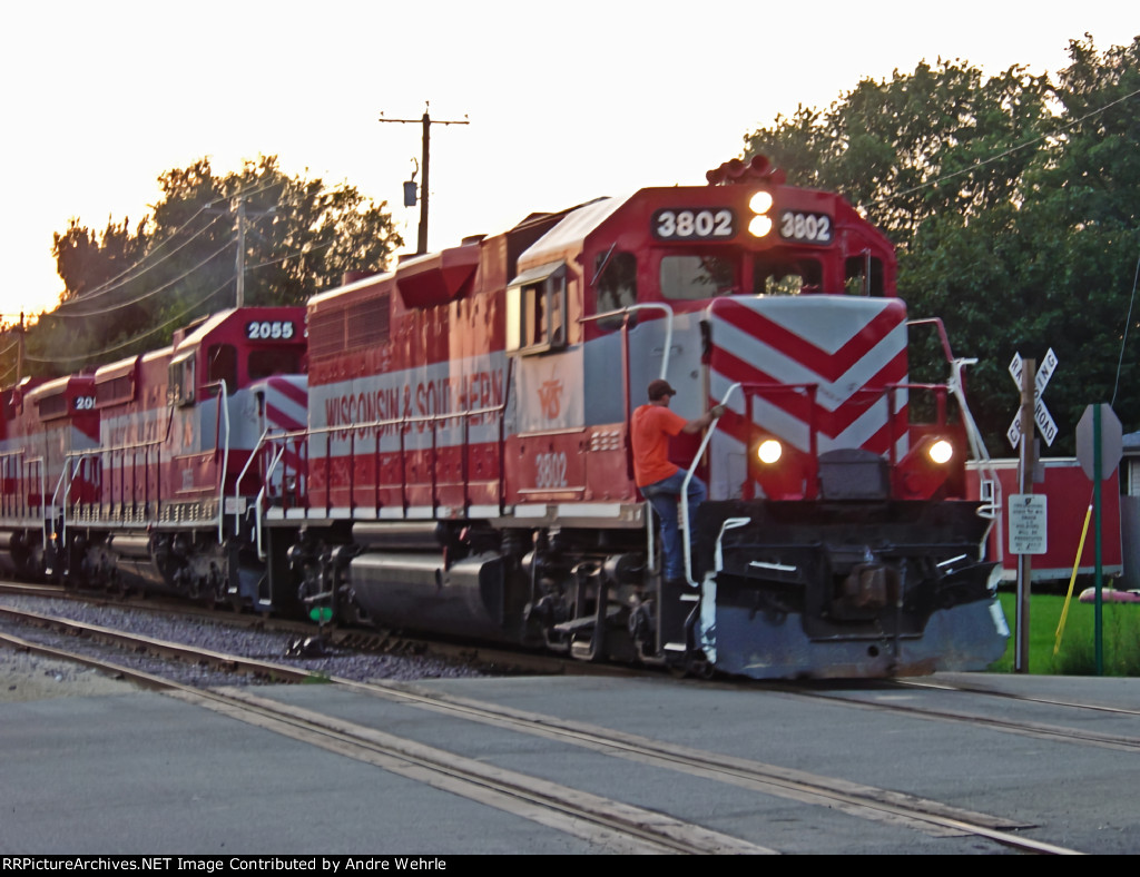 WSOR 3802 as the conductor climbs back on
